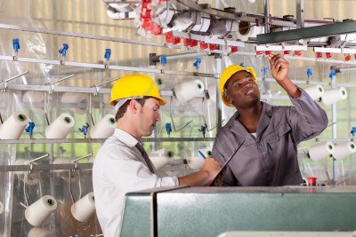 16013936-textile-factory-worker-and-quality-controller-checking-quality